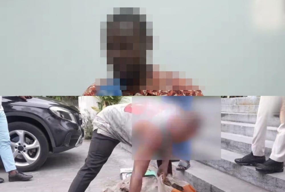 Rue animée d'un quartier de Libreville en soirée, éclairage urbain