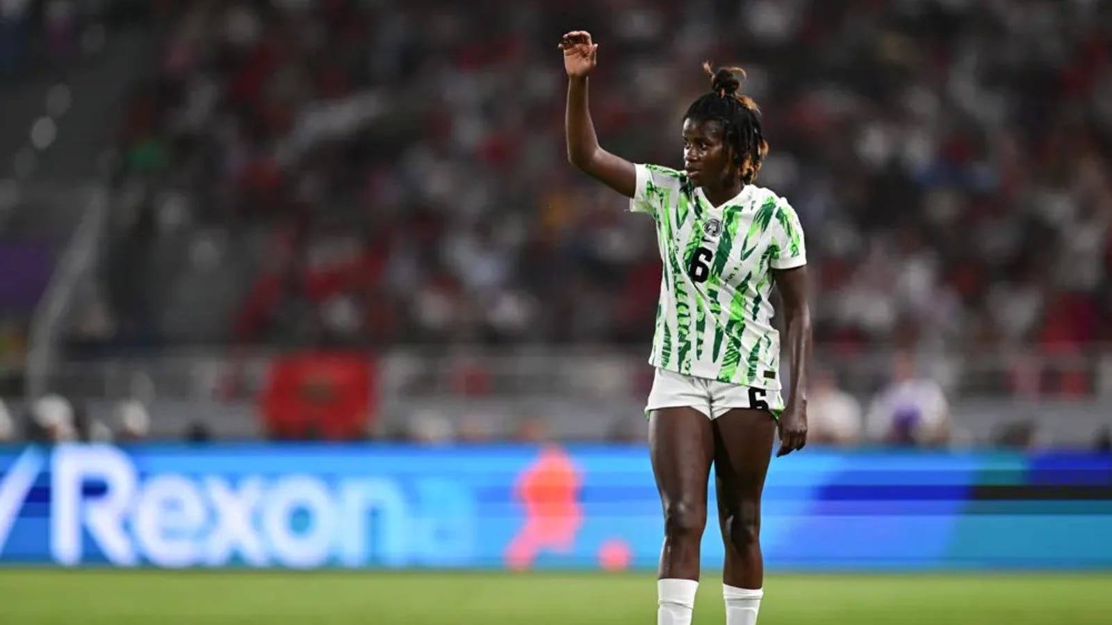Joueuses de football disputant un match lors de la Coupe d'Afrique des Nations Féminine