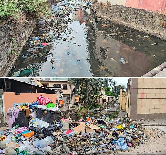 Caniveau bouché par des déchets plastiques dans un quartier de Libreville
