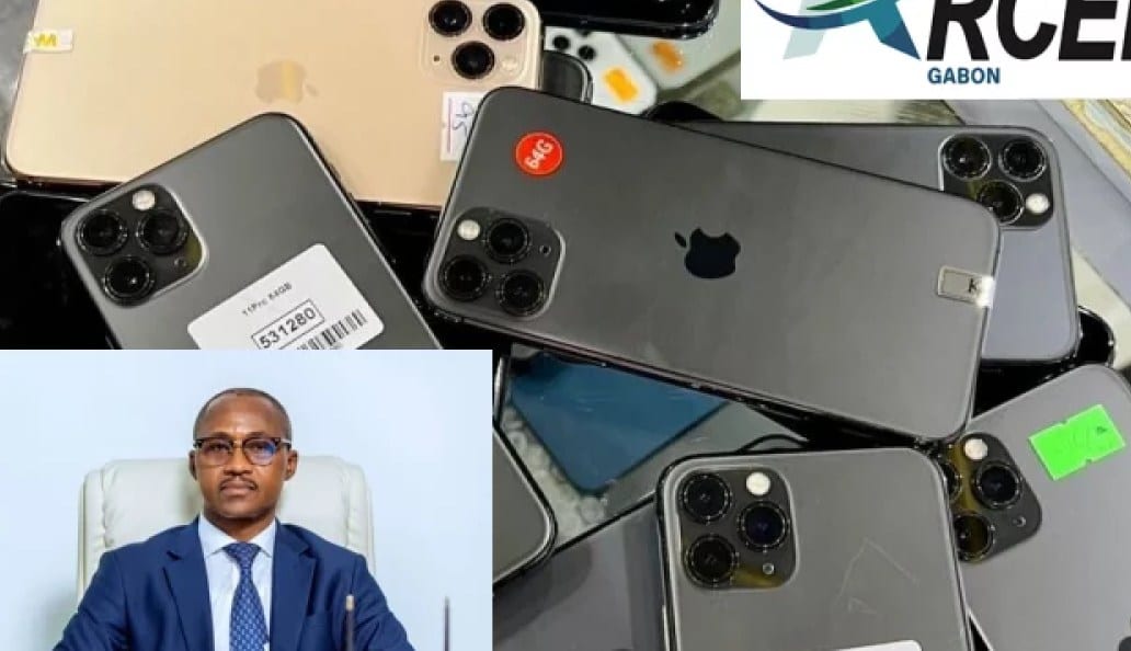 Vendeur de téléphones portables sur un étal de marché au Gabon